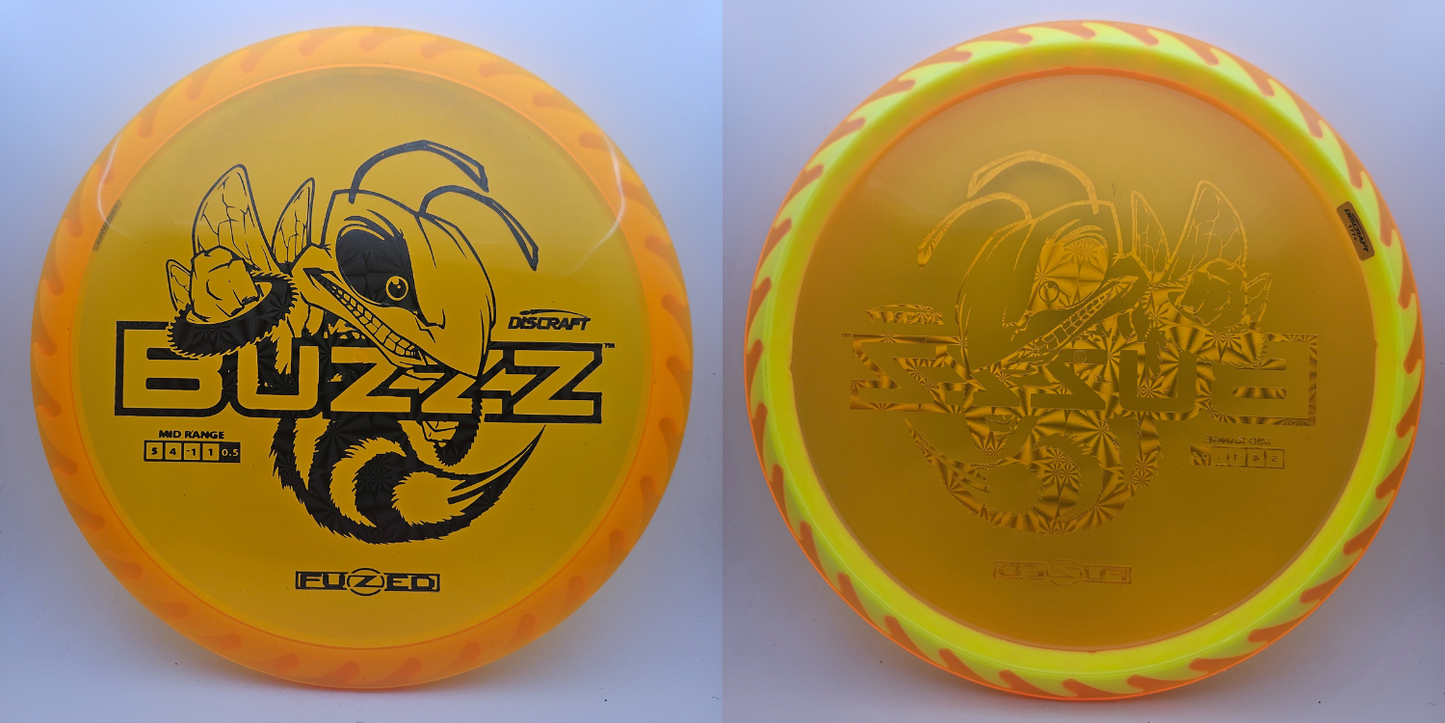 #11305 177+g Orange / Yellow, Black Pinwheel Foil, Buzzzsaw Fuzed Buzzz