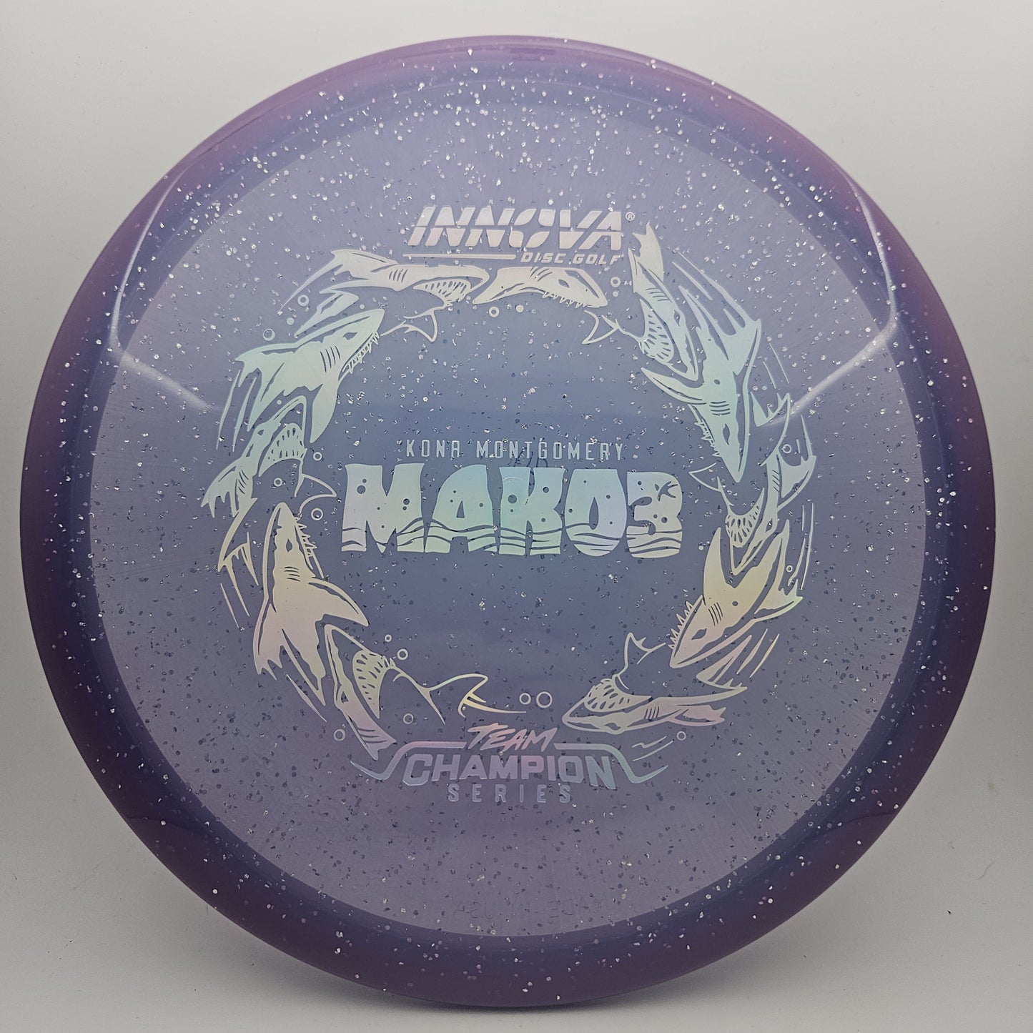 #18205 180g Purple, Kona Montgomery Tour Series Metal Flake Halo Champion Mako3 - Kona Montgomery Tour Series